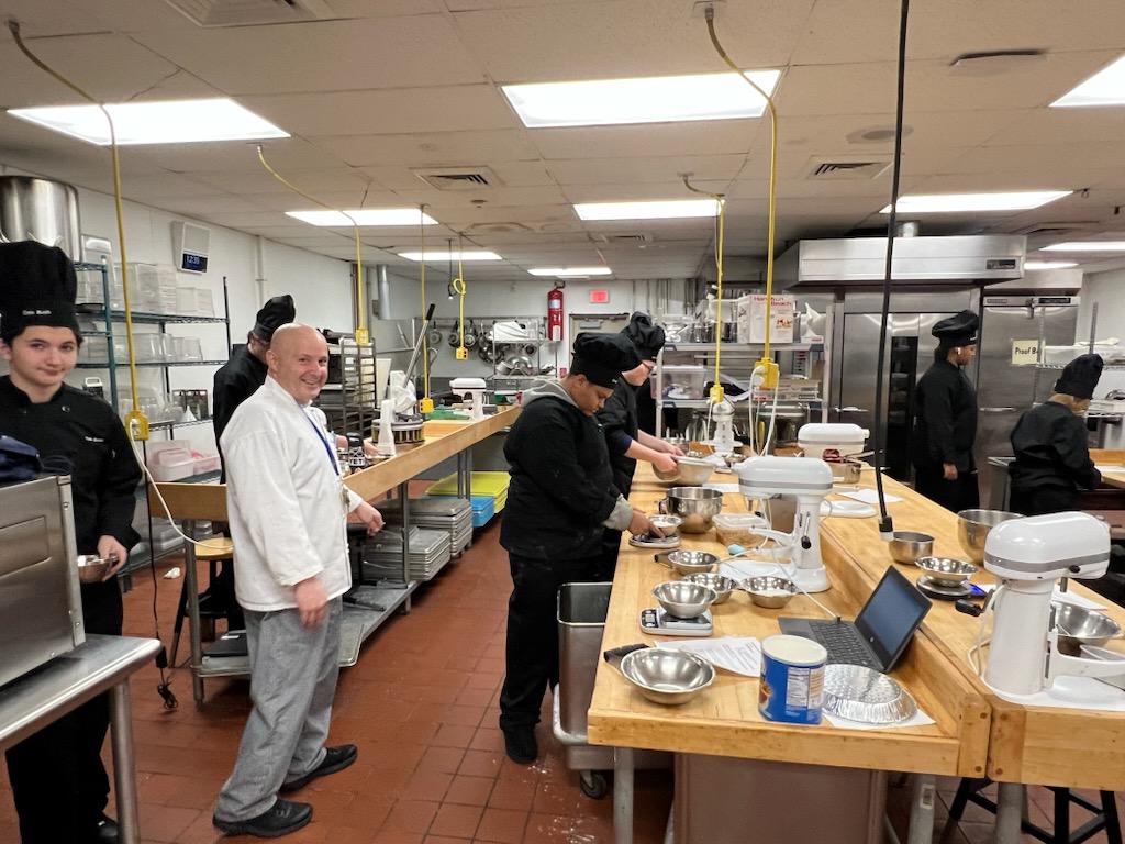 OCM Boces students and instructor preparing cookies